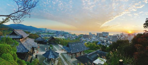 High angle view of townscape against sky during sunset