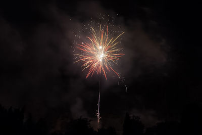 Gold and blue fireworks on the feast of the patron saint of the city, vittorio veneto, italy