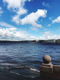 View of lake against cloudy sky