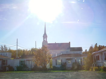 Sun shining through building