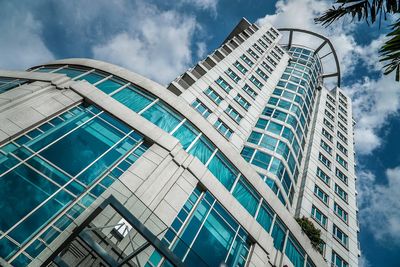 Low angle view of modern buildings against sky