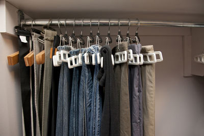 Close-up of clothes hanging on rack