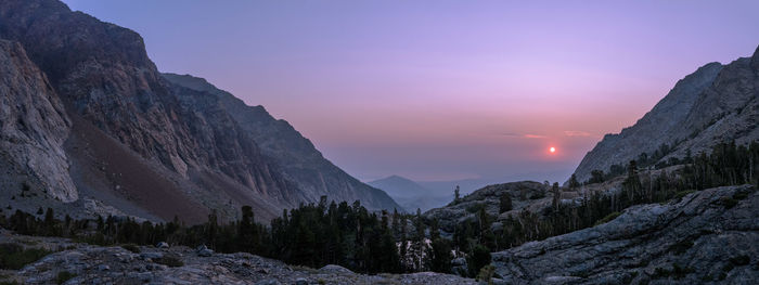 Scenic view of mountains against sky during sunset