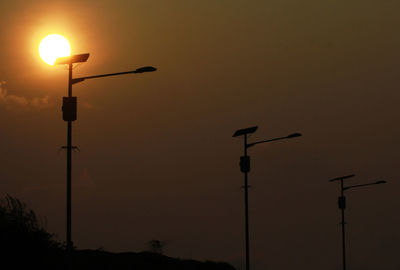 Low angle view of street light at night