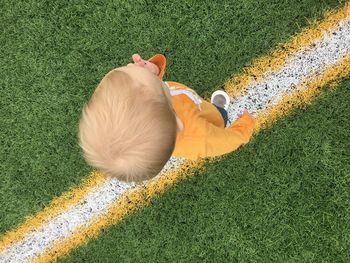 High angle view of boy on field