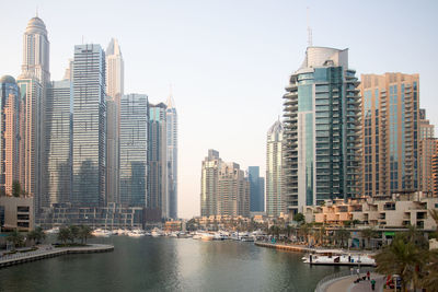 Modern buildings in city against sky