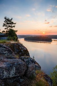 Scenic view of sea at sunset