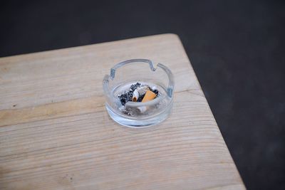 High angle view of cigarette on table