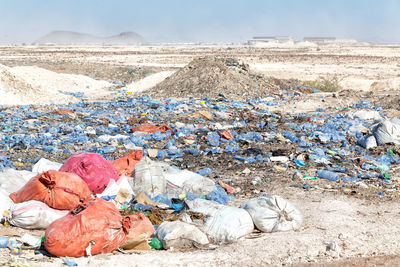 View of garbage on dumping ground