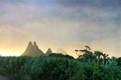 Scenic view of landscape against sky during sunset