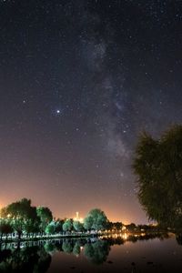 Scenic view of illuminated star field against sky at night