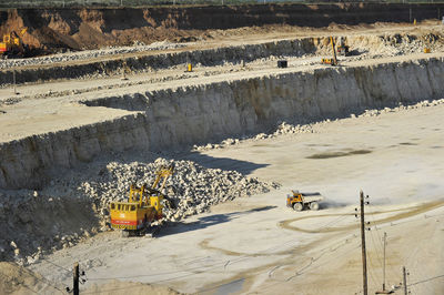 High angle view of earth mover working at quarry