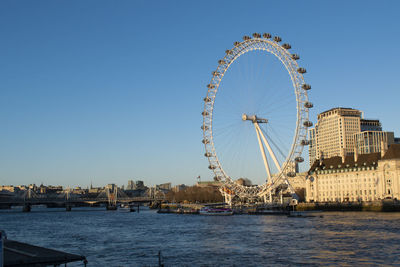 View of city and london eye at waterfront