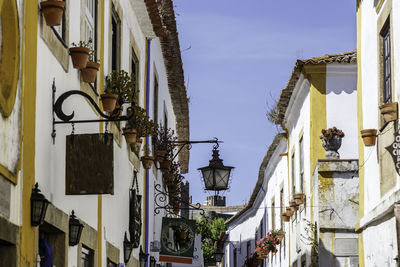 Low angle view of houses against sky