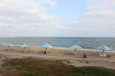 Scenic view of beach against sky at alexandria