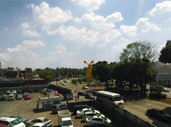 High angle view of cars on road against sky