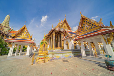 Temple outside building against sky