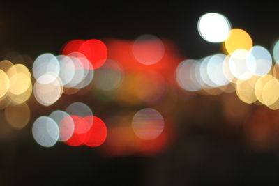 Defocused image of illuminated lights at night