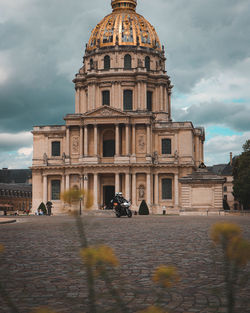 View of historic building against cloudy sky