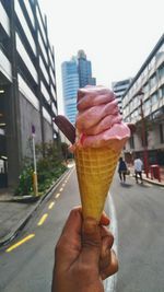 Woman holding ice cream cone