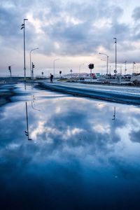 Scenic view of sea against cloudy sky