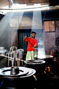 Man preparing food in kitchen