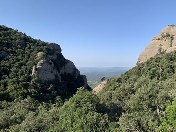 Scenic view of mountains against clear sky