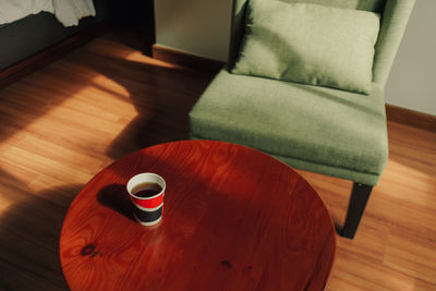 High angle view of coffee cup on table