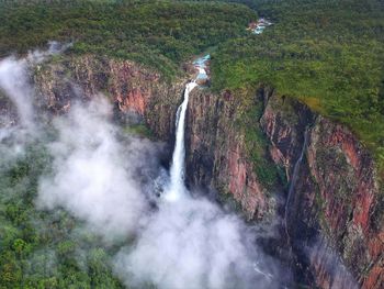 High angle view of waterfall in forest