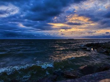 Scenic view of sea against sky during sunset