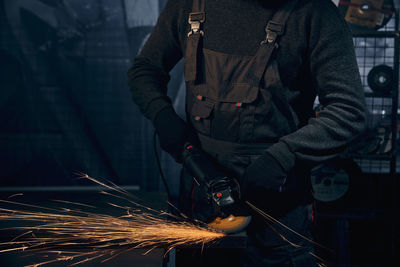 Man working on metal structure