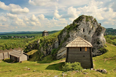 House on field against sky