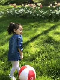 Girl standing on field