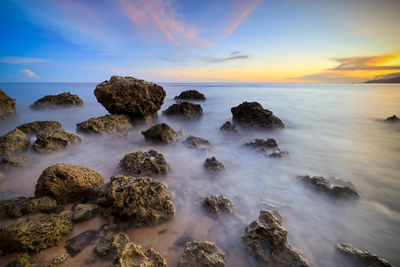 Scenic view of sea against sky during sunset
