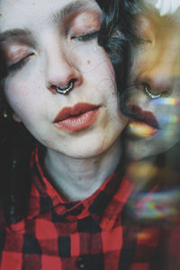 Close-up portrait of a young woman