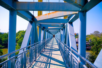 View of footbridge against sky