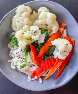 High angle view of chopped vegetables in plate