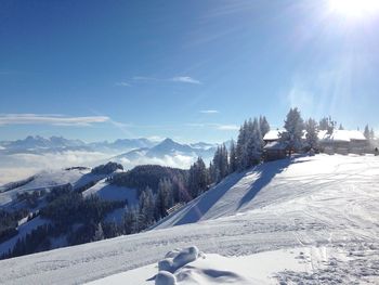 Scenic view of landscape against sky during winter