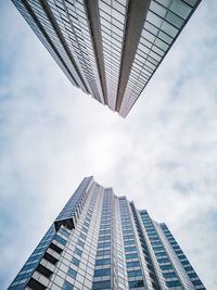 Low angle view of modern building against sky