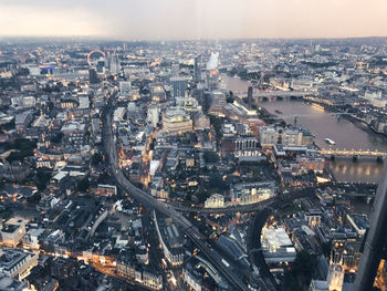 High angle view of illuminated buildings in city