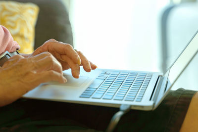 Man using laptop on table