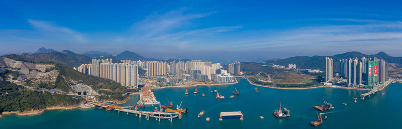 High angle view of illuminated cityscape against sky