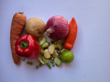 Close-up of fruits against white background