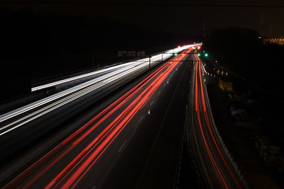 High angle view of light trails at night