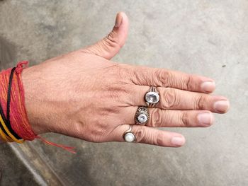 Close-up of hand wearing rings