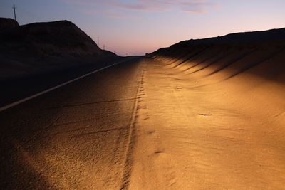 View of empty road on desert