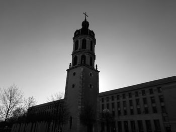 Low angle view of clock tower against sky