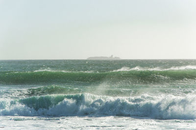 Scenic view of sea against clear sky