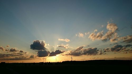 Scenic view of silhouette landscape against sky during sunset