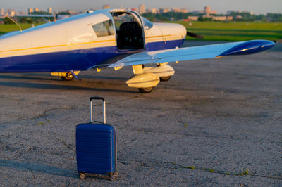 Close-up of airplane on airport runway